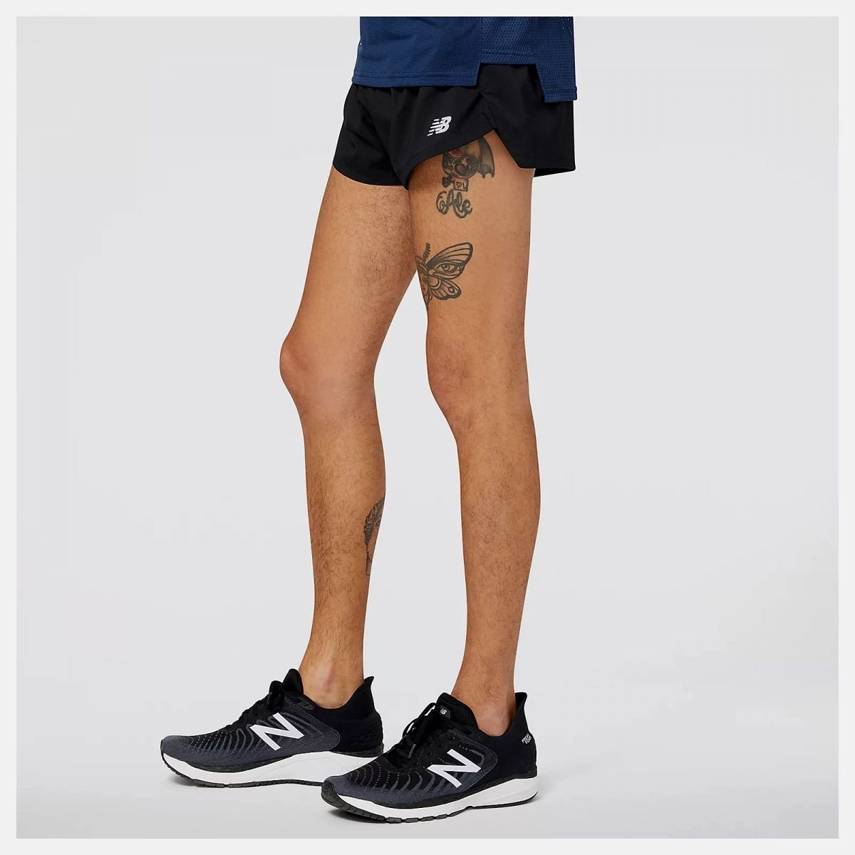 Bermuda New Balance Accelerate Split - masculino - preto e cinza
