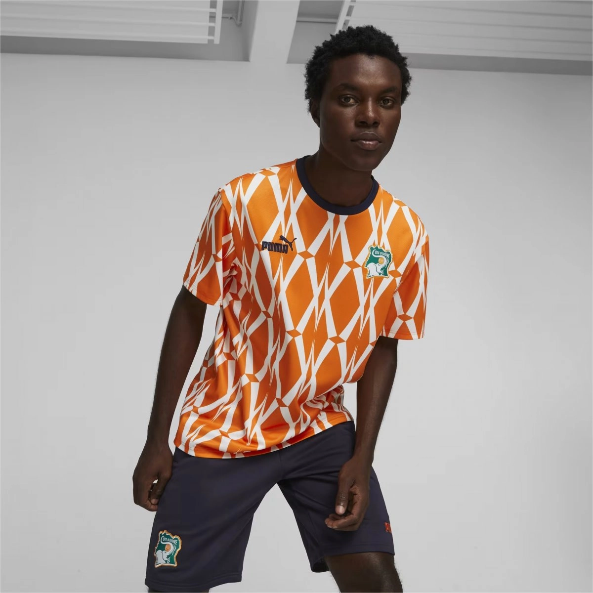 Camiseta Puma Costa Do Marfim Ftbculture - masculino - laranja e branco